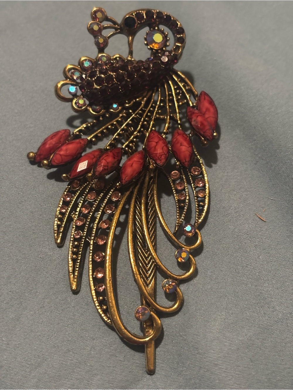 Vintage-Inspired Gold Peacock Clip with Red Marquis cut stones